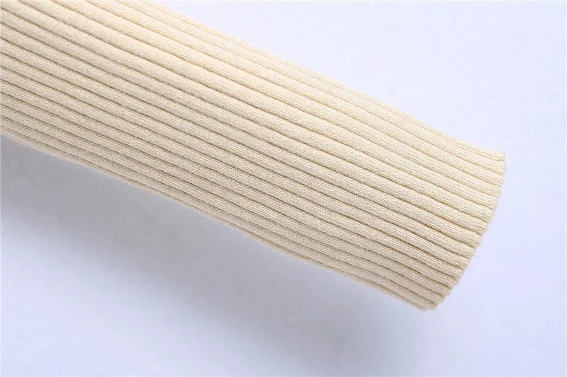 SHOULDERS KNIT SWEATER